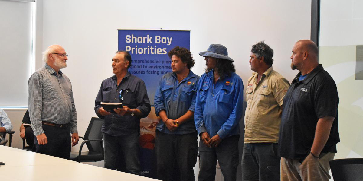 A group of people from UWA and Malgana Rangers at a presentation of Shark Bay research